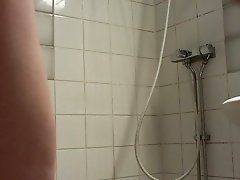 I am taking the shower and shave my beautiful cock and legs
