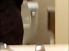 Horny guy jerks off and cums in public bathroom