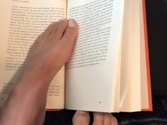 Sexy Feet Reading a Book on a Rainy Day