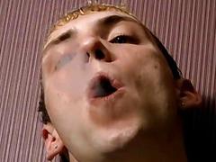 Smoking twink licks his own big fat cock and tugs it hard