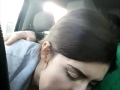 Amateur brunette teen gives a wonderful blowjob in the car