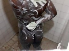 Thicc black man taking a shower