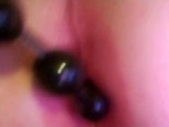 Inserting anal beads